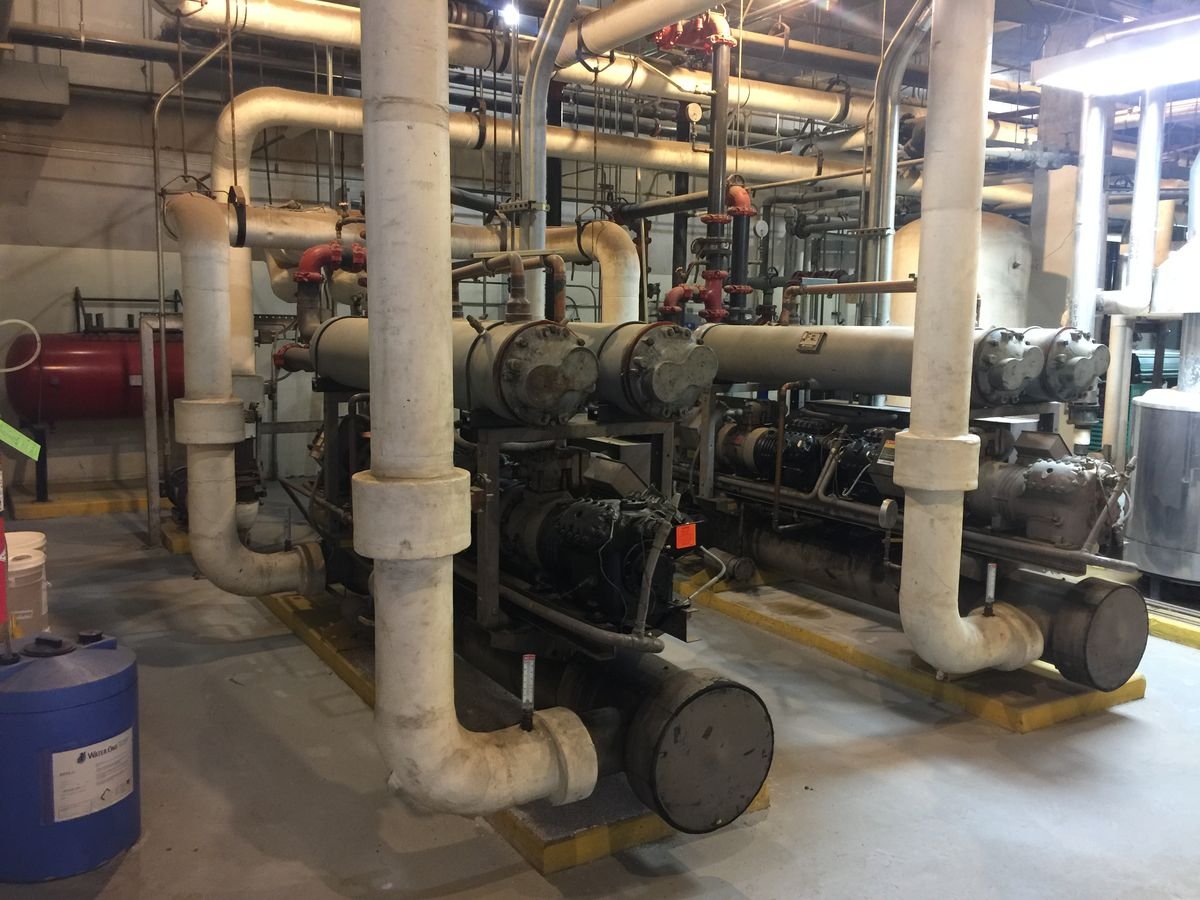 Mechanical room with water-cooled chillers and insulated piping