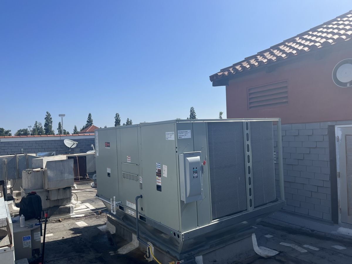Residential rooftop air conditioning unit on a Fresno home
