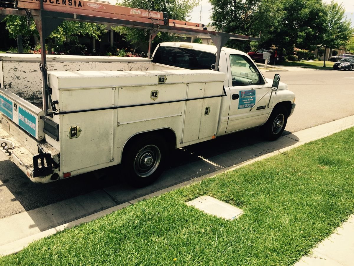 JP Air Conditioning service truck at a Fresno job
